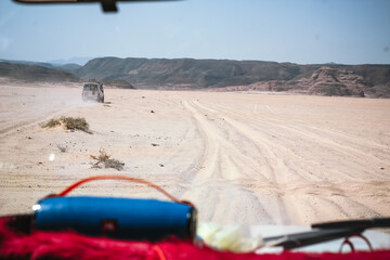 Dahab desert road in Egypt's Sinai Peninsula, view from the cabin of a jeep