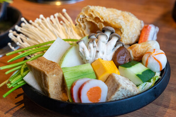 Enjoy authentic and delicious hot pot dishes with rich vegetables, tofu, meat slices, mushrooms and hot pot ingredients that are super nutritious and fresh