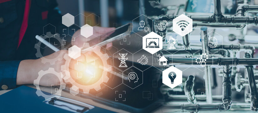 Engineering services concept. Electrical engineer use computer laptop checking and analysis data of power plant station project, internet system network, electric, energy, robotic. Industry engineer