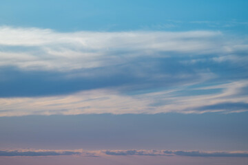 Fototapeta premium evening sky with clouds and rays of the sun, background
