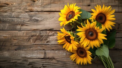 Obraz premium Sunflowers bouquet on wooden backdrop