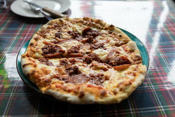 thin crust all-meat pizza