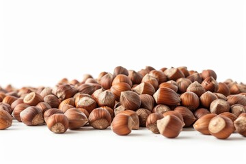 Fototapeta premium A collection of hazelnuts arranged on a clean, white background