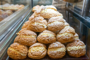 Delicious handmade puffs of the day are displayed on the counter