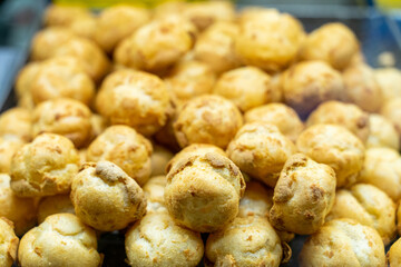 Delicious handmade puffs of the day are displayed on the counter