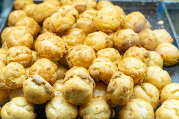 Delicious handmade puffs of the day are displayed on the counter