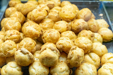 Delicious handmade puffs of the day are displayed on the counter
