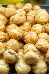 Delicious handmade puffs of the day are displayed on the counter
