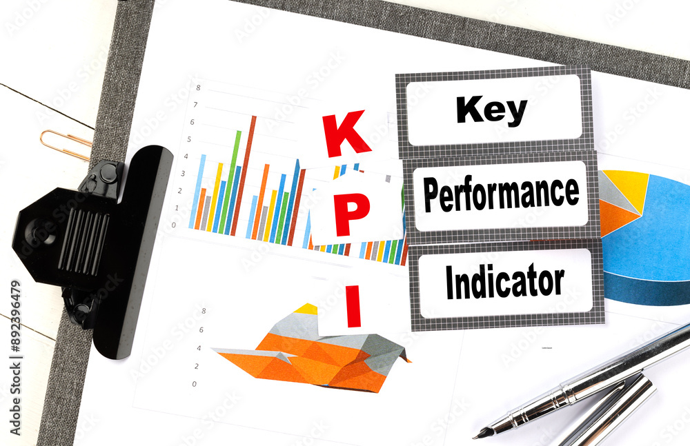 Poster kpi word on sticky on chart background