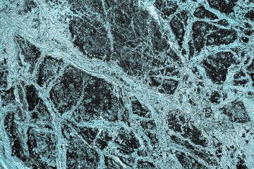 Mur de marbre texturé avec effet bleu opale lumineux