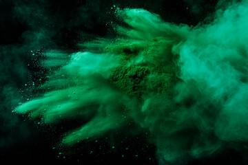 Fototapeta premium abstract green powder splash on black background