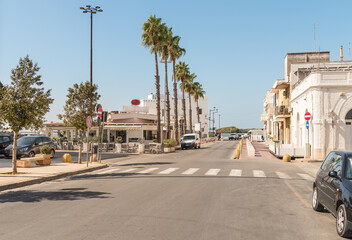 Street in the center of Porto Cesareo, seaside resort on the Ionian sea in province of Lecce, Puglia, Italy