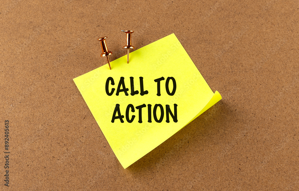 Poster call to action text on yellow sticky on board background