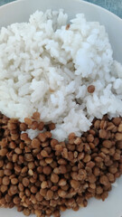 brown cooked lentils with white rice
