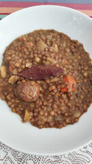 brown cooked lentils with sausage meat