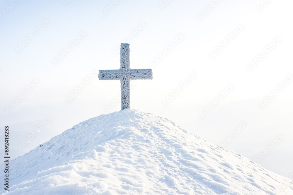 Poster Frosty Cross on a Snow Covered Mountain Peak