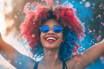 Independence Day 4th of July celebrations. Happy creative black female with red and blue hair celebrating