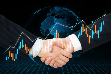 Business handshake with financial chart overlay on dark globe background.