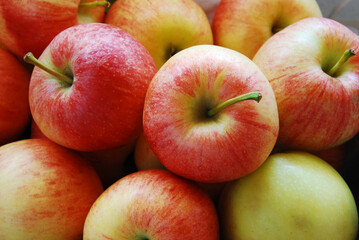 Many fresh Apples on a market booth