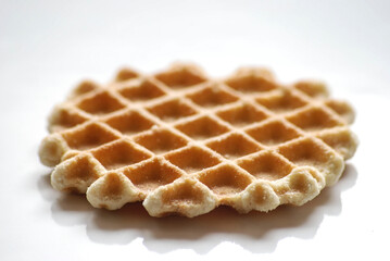 Macro close up shot of a sugar waffle