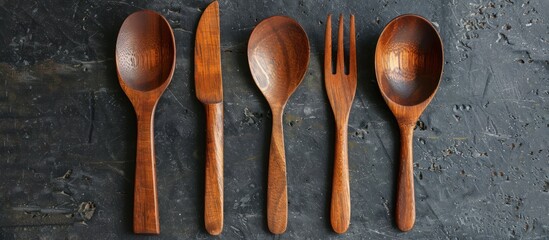 Wooden Utensil Set on a Rustic Background