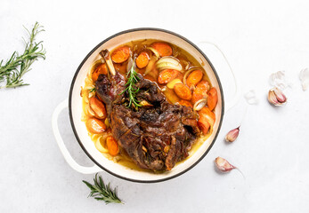 Lamb shoulder braised in a cast iron pan