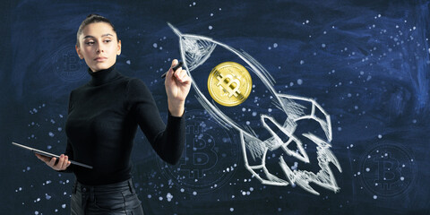 A woman holding a stylus near a chalkboard with a creative Bitcoin rocket drawing on a dark blue background, illustrating a financial concept