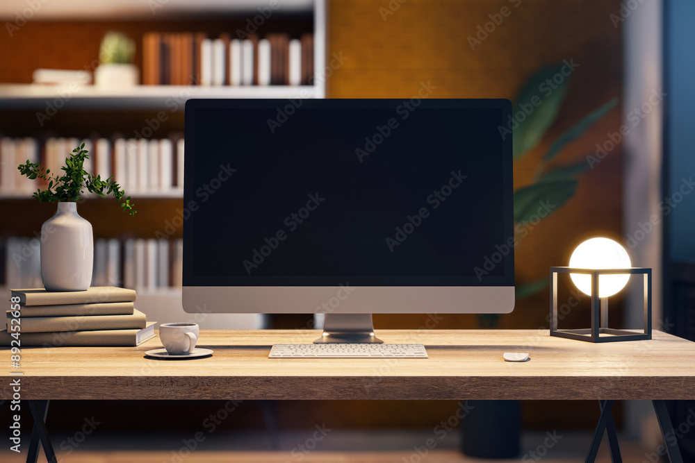 Poster modern computer monitor on a wooden desk with books, decorative plant, and lamp, depicting a cozy of