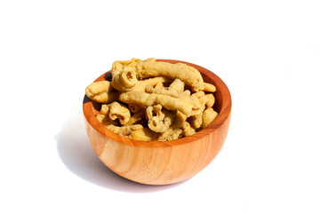 Fried chicken intestines Indonesian food is called usus goreng in a small wooden bowl isolated on white background