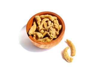 Fried chicken intestines Indonesian food is called usus goreng in a small wooden bowl isolated on white background