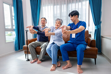 Senior Asian couple got medical service visit from male caregiver nurse at home while doing physical therapy to shoulder stretching for muscle pain in health care and pension welfare