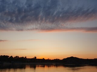 Beautiful sunset on the river bank.