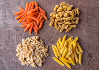 Heaps of Different Types of Pasta. Healthy Pasta Concept. Farfalle, Penne, Fusilli. Top View.