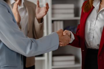 two big companies handshake because they agree on a business deal, businesspeople just signed...