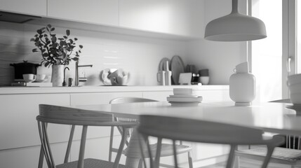 A classic black and white photo of a traditional kitchen setting