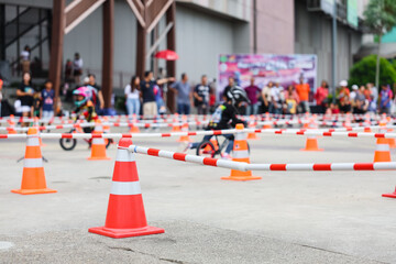 Fototapeta premium orange Traffic cones and Retractable Cone Bar on track in balance bike racing