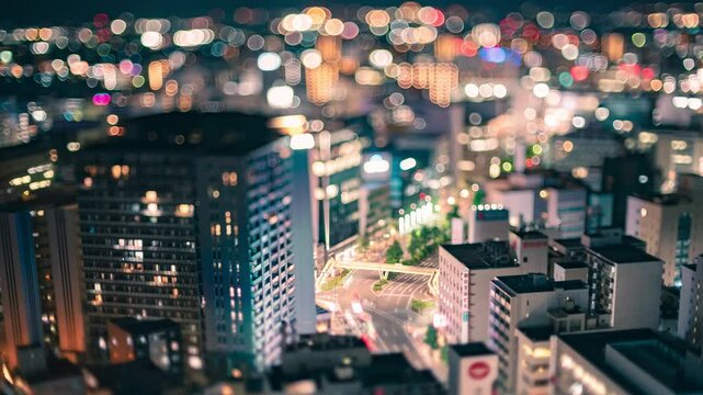 高層ビルから撮影したミニチュア夜景タイムラプス ジオラマ交差点都市景観