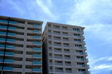 Photographs of apartment(condominium) buildings. The photograph is designed for composition and perspective.