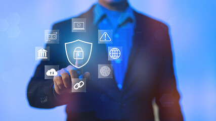 Concept of cyber crime and cybersecurity. Hand show protecting systems, networks, and programs from digital attack. Protecting internet connected systems.