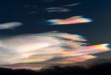 mother of pearl clouds , polar stratospheric clouds with vivid colour 