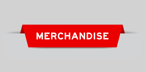 Red color inserted label with word merchandise on gray background