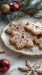 a white plate topped with cookies covered in icing