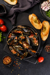 mussels cooked on a blackboard