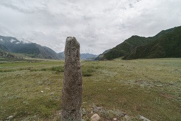 tombstone monument of man warrior of the Bulan-Kobin (Bulan-Koba) culture in the Kur-Kechu tract in...