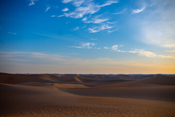 sunset sunrise with beautiful cloud color in the desert sand dune.