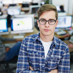 Fototapeta premium Man, confident and serious in workplace for portrait, creative agency and web design career in start up business. Professional, crossed arms and proud employee in office, ux designer and company
