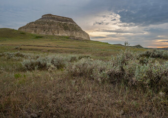 Sagebrush and Castle Butte in the evening light at Big Muddy Valley, Saskatchewan, Canada
