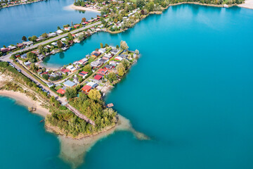 Naklejka premium Bird's eye view of a quarry lake in the Hessisch Ried
