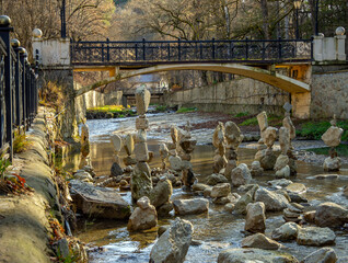 Pyramids of “balancing” stones in the bed of the Olkhovka River, Kislovodsk