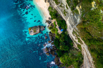 Top down view aerial shot of beautiful Diamond Beach in Nusa Penida, Bali, Indonesia